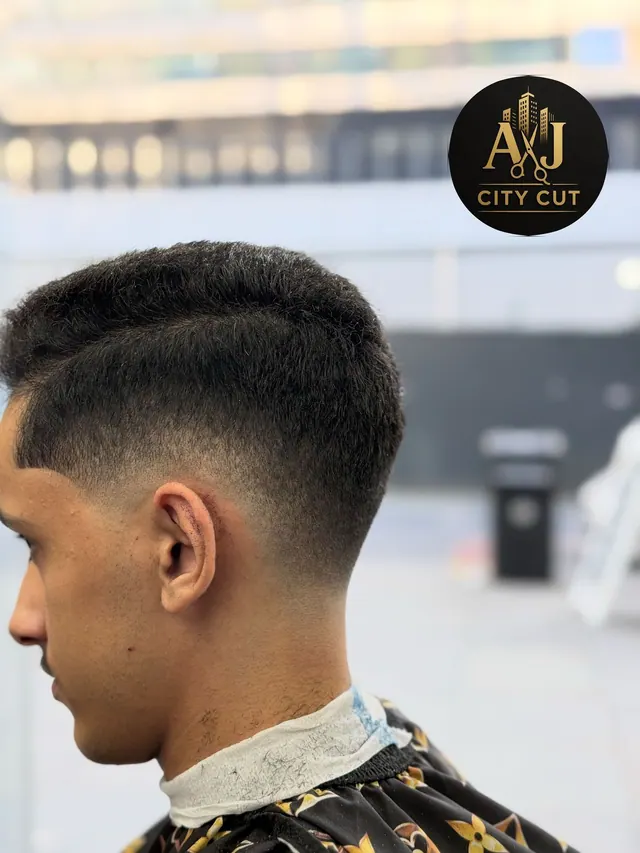A side part with a low fade